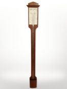 A continental maohgany mercury stick barometer, length 95cm.