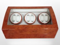 A contemporary automatic watch winding display case, with lead,