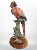 A Guiseppe Armani figure of a parakeet, height 40cm.