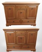 A pair of reproduction Rossmore sideboards, each 132cm wide x 44cm deep x 100cm high.