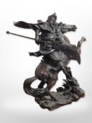 A contemporary patinated bronze figure of a Chinese warrior on horseback, height 47cm.