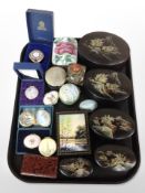 A group of graduated oriental lacquered trinket boxes,