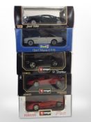 Three Burago scale model cars, a further Revell car, and a Maisto car, all boxed.