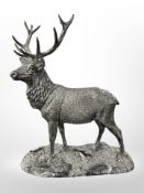 A contemporary filled silver model of a Stag by Tom Mackie, height 25cm.