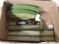 Two vintage Louis Marx & Co tin-plate wind-up racing cars and a quantity of track.