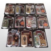 11 Kenner Star Wars figurines, boxed.