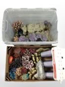 An aquarium filtration system and a quantity of aquarium ornaments.