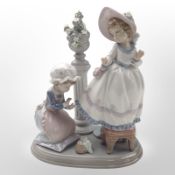 A Lladró figure. 'A Stitch In Time', No. 5344, boxed.