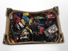 A collection of play-worn die-cast vehicles including Corgi.