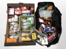 A tool bag and contents, together with a further box containing assorted light bulbs.