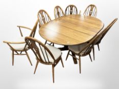 An Ercol 'Golden Dawn' extending pedestal dining room table, 166cm wide x 115cm deep (extended),