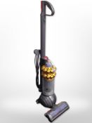 A Dyson DC 50 upright vacuum cleaner.