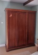 A Willis and Gambier triple door mahogany wardrobe, width 163 cm, height 150 cm.