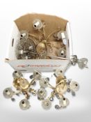 A group of 20th-century continental chandeliers with crystal droplets, all wired for electricity.