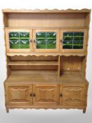 A Danish oak and stained glass dresser, 148cm wide x 47cm deep, 188cm high.