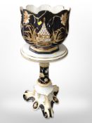 A contemporary continental ceramic jardiniere on stand, height 87cm.