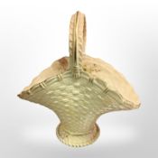 A Royal Worcester blush ivory basket, shape number 993, height 19cm.