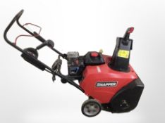 A Briggs & Stratton 800 Snow Series 205cc snow blower.