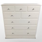 A contemporary single door cabinet with dummy drawers,