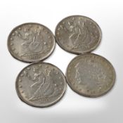 Three American silver trade dollars, and a further 100 cent coin.