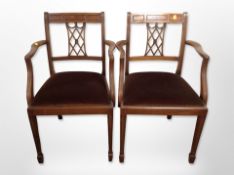 A pair of reproduction mahogany armchairs