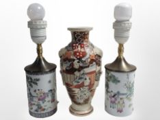 A pair of 20th-century Chinese porcelain cylindrical vases converted to table lamps, height 29cm,