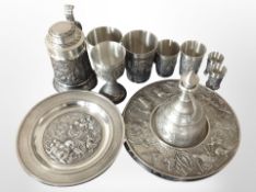 A group of German pewter wares including ornate dishes, goblets, cups, stein, etc.