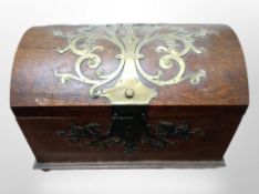An oak and metal-bound dome-topped table casket, width 36cm.