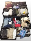 A very large quantity of assorted clothing, denim jeans, hats, leather jacket, etc.