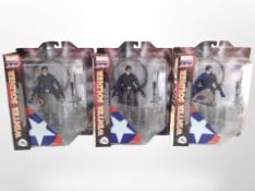 Three Disney Store Marvel Select The Winter Soldier figurines, boxed.