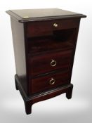 A Stag bedside chest, 40cm wide x 32cm deep x 65cm high.