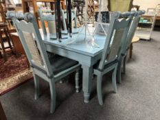 An early-20th century continental painted pine extending dining table,