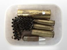 A group of inert World War II brass shells and bullets.