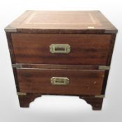 A campaign style mahogany and brass mounted two drawer low chest,