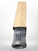 A roll of wire metal trellis.