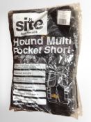 Four pairs of Site work trousers, as new.