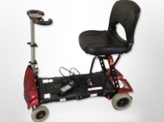 A Monarch Solax mobility scooter, with charging lead.