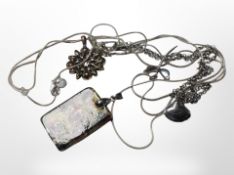A Murano glass pendant on silver chain, together with three further silver chains and pendants.