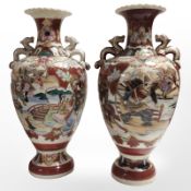 A pair of 20th-century Japanese export earthenware vases, height 37cm.