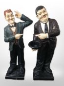A large pair of composition figures of Stan Laurel and Oliver Hardy,