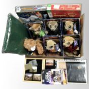 A group of CompareTheMeerkat toys, board games, etc.