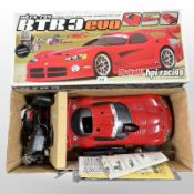 An HPI Racing RTR3 Evo 1/10th scale four-wheel drive nitro-powered RC car, in box.