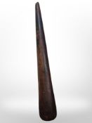A turned hardwood conical club/cosh, length 36cm.