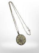 A silver and enamel pendant on chain depicting a Yorkshire rose
