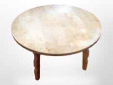 A 20th-century Danish blonde oak coffee table, diameter 90cm.