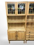A Danish oak and stained glass dresser, 80cm wide x 40cm deep, 185cm high.