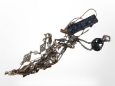 A Swarovski misty crystal pendant in silver setting, a further crystal pendant,