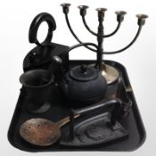An EPNS five-sconce table candelabrum, together with a cast-iron pestle and mortar, two irons,