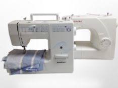 A Singer electric sewing machine, and a Silver Crest electric sewing machine (no plugs or pedals).