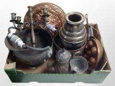 A group of metal wares to include 19th-century copper coal helmet, charger, copper kitchen pans,